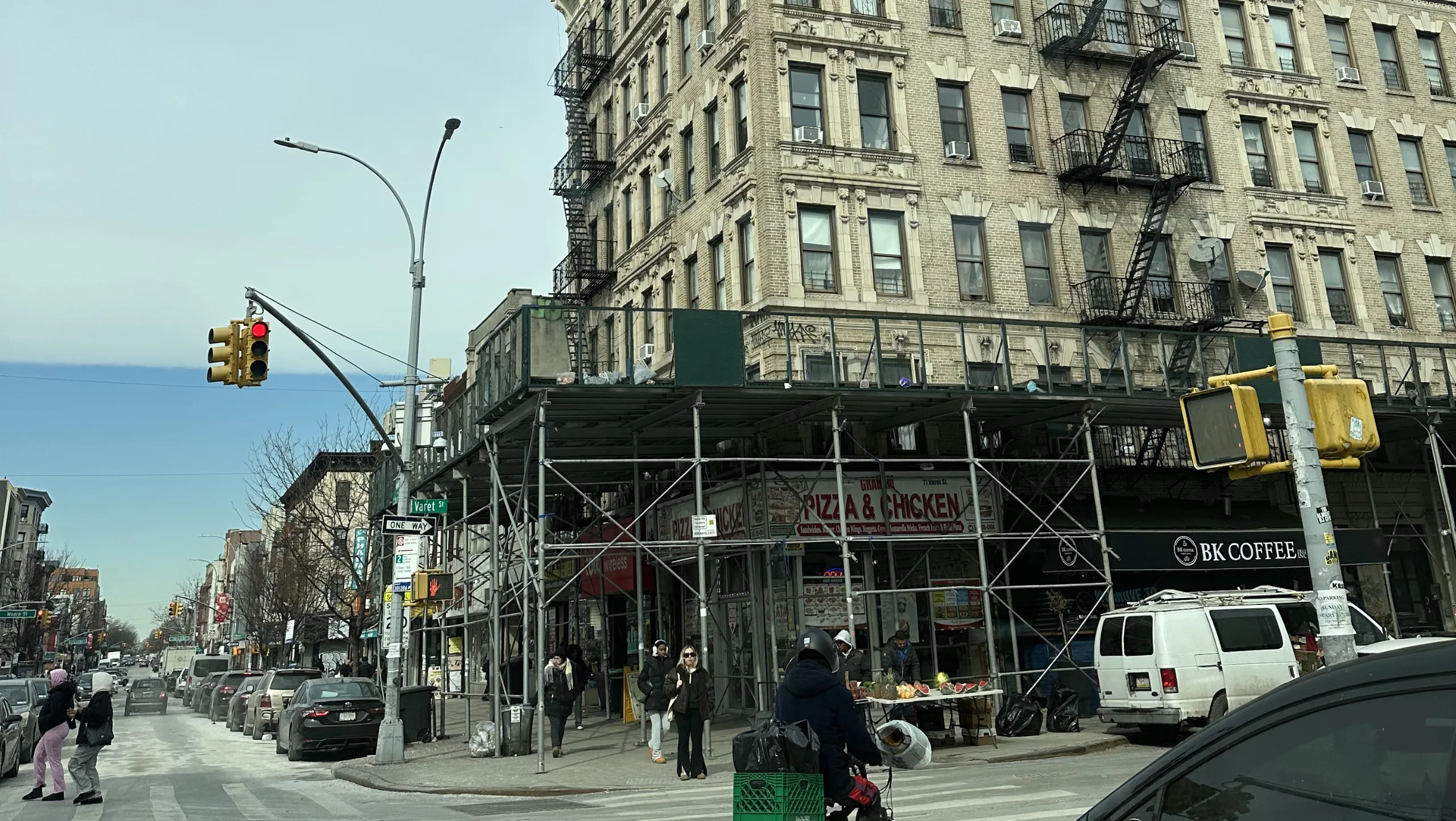 Long Island construction safety awareness featuring secure scaffolding and sidewalk shed installations on urban buildings
